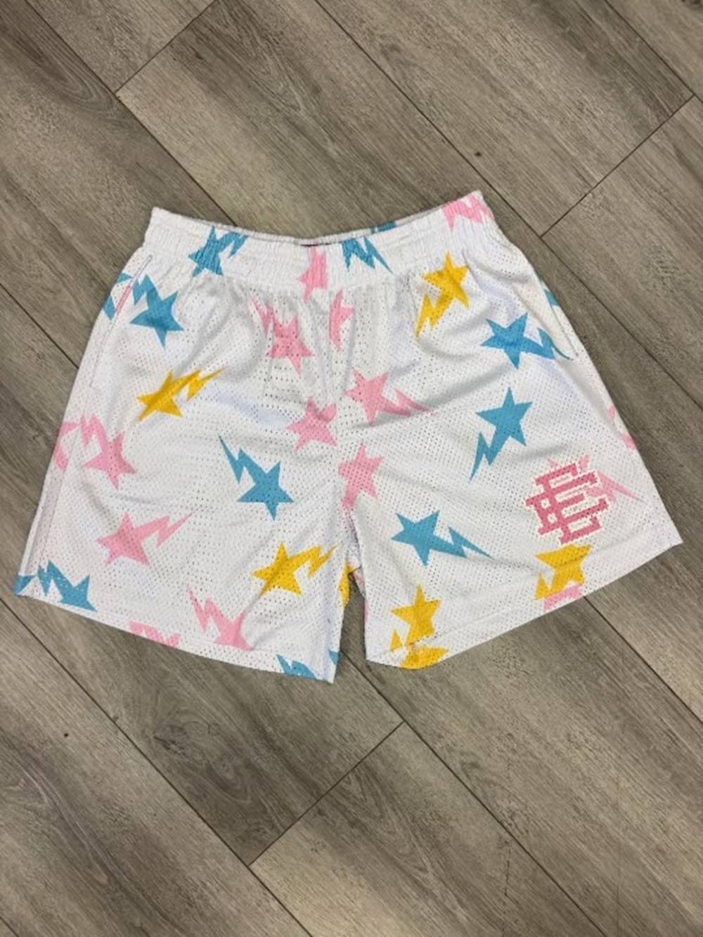 Bape White Athletic Shorts with Pink Blue and Yellow Star Print
